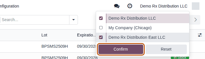 Screenshot of the company switcher with two companies ticked over the Packages list. The Confirm button is outlined.